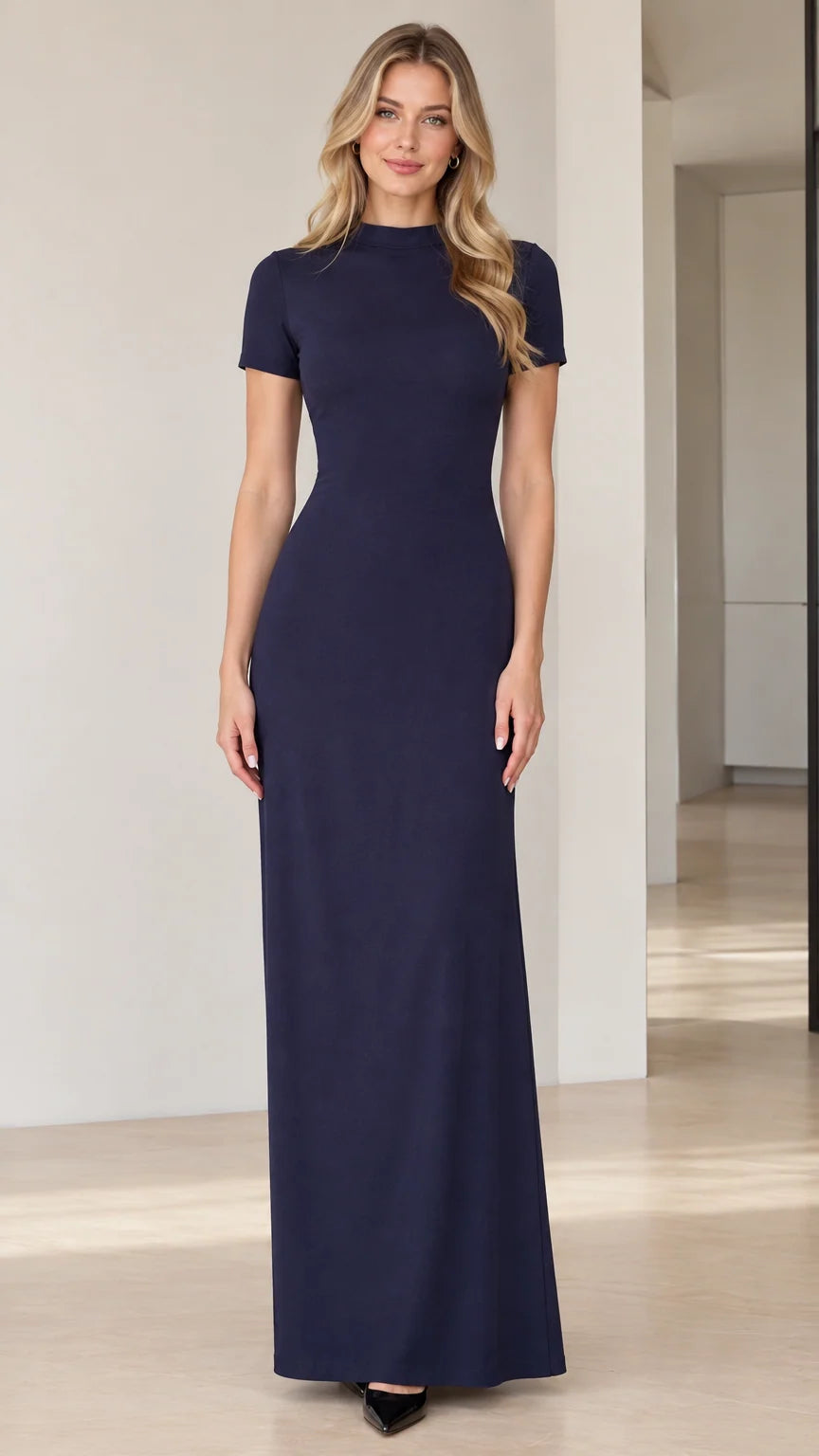 Front view of model wearing Navy Blue mock neck short sleeve maxi column dress