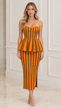 Front full-length view of model wearing the orange striped strapless peplum midi dress