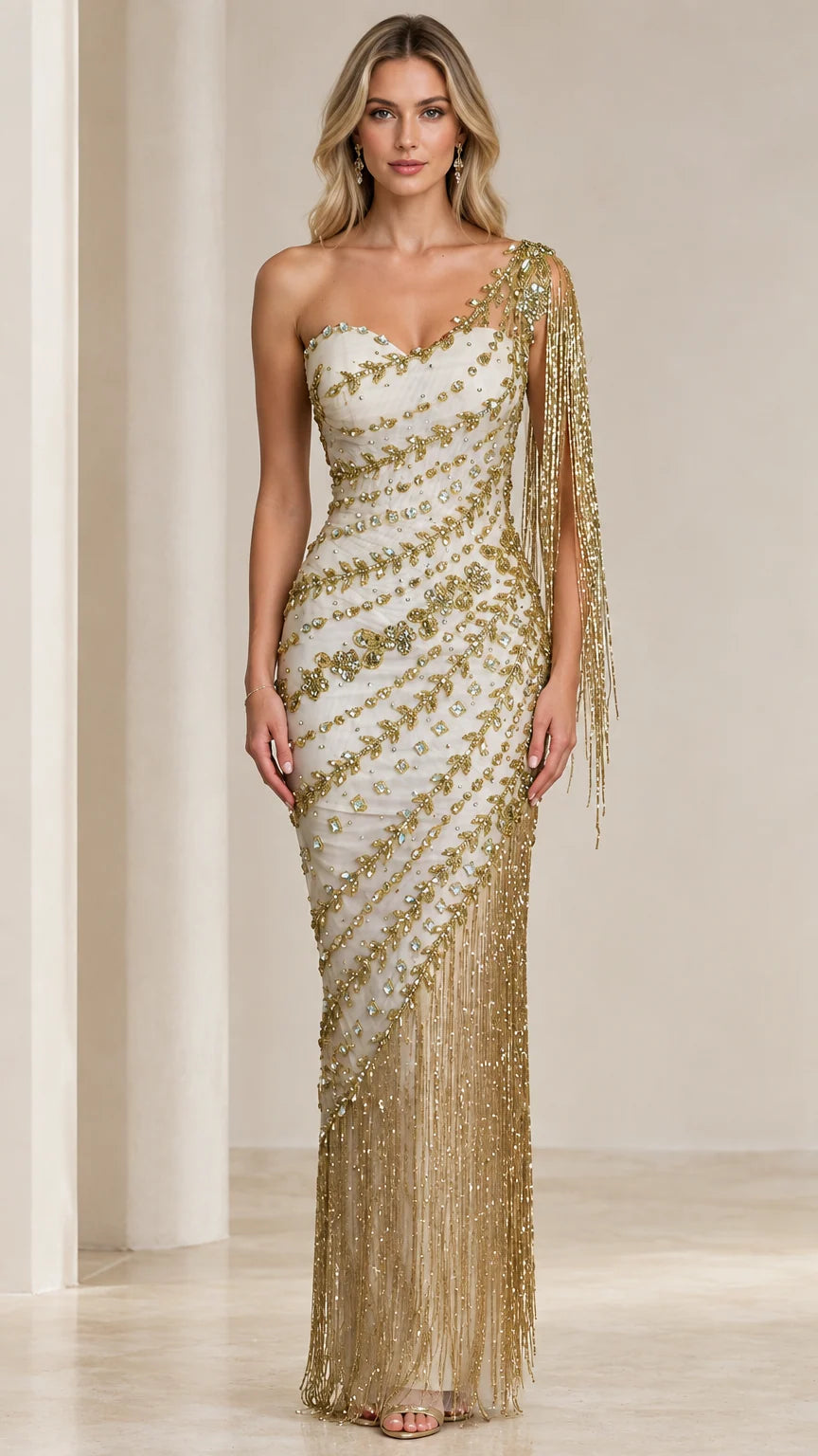 Front full-length view of model wearing Ivory Gold one-shoulder beaded fringe evening gown