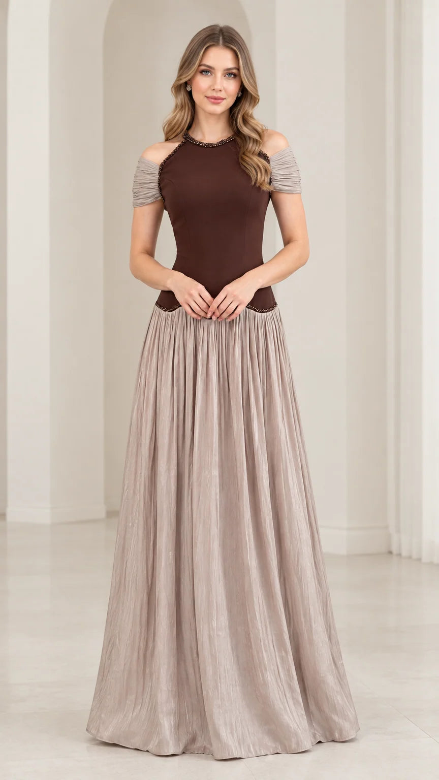 Front view of woman wearing chocolate brown and taupe cold shoulder beaded pleated maxi dress