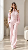 Full front view of model wearing Light Pink ribbed cold shoulder zip top and wide leg pants set