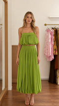 Front view of green pleated cami top and midi skirt two-piece set on model