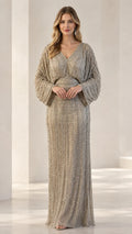 Front view of model wearing Champagne sequin embellished maxi gown with balloon sleeves