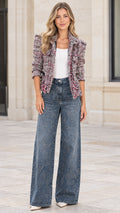 Front view of model wearing Pink Multi cropped tweed jacket with wide-leg jeans