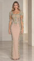 Front view of model wearing Nude square neck embellished evening gown with beaded fringe sleeves