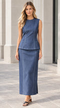 Front view of woman wearing Denim Blue sleeveless peplum top and matching maxi skirt set