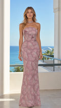 Front view of model wearing mauve beaded strapless mermaid evening gown