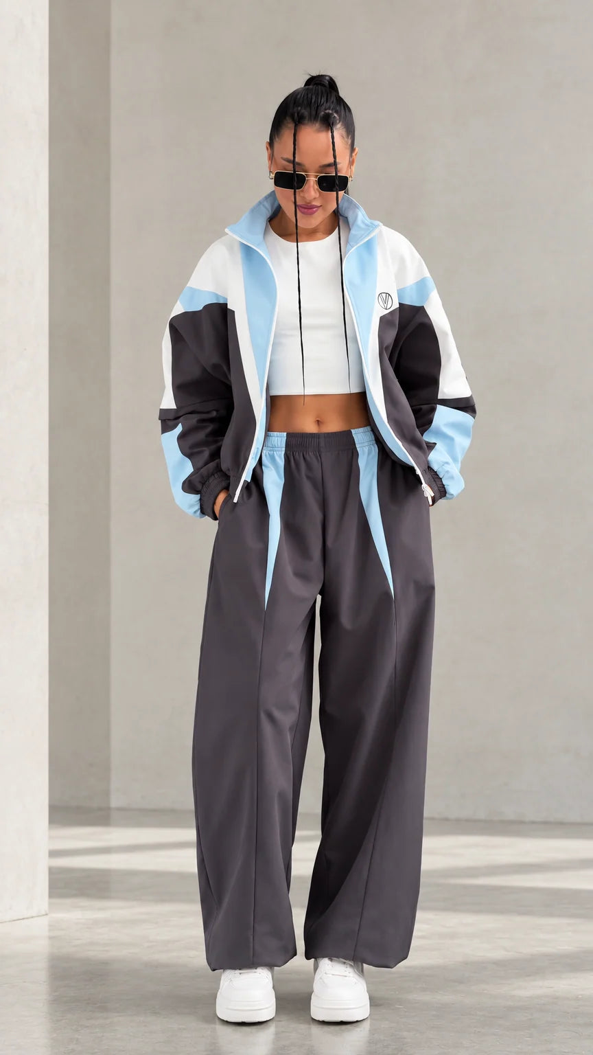 Model wearing Charcoal Grey colorblock tracksuit set front view