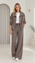 Front view of model wearing taupe utility jacket and wide-leg pants set