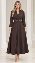 Front view of model wearing dark brown lapel collar belted A-line maxi dress