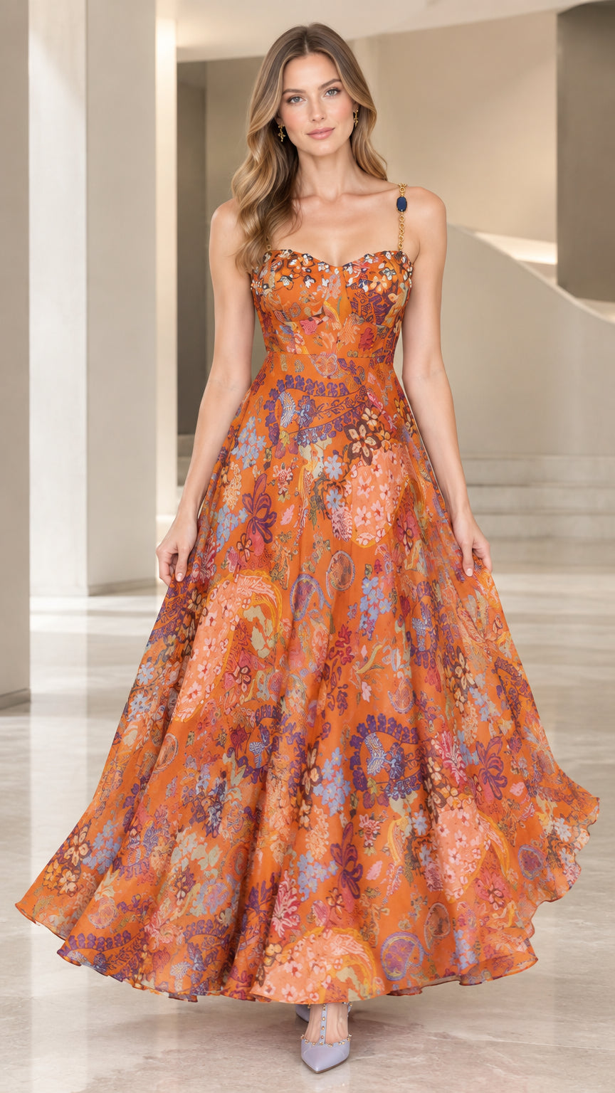 Front view of model wearing a rust floral sweetheart corset A-line maxi dress