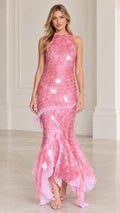 Front view of model wearing pink halter neck textured petal mermaid maxi gown