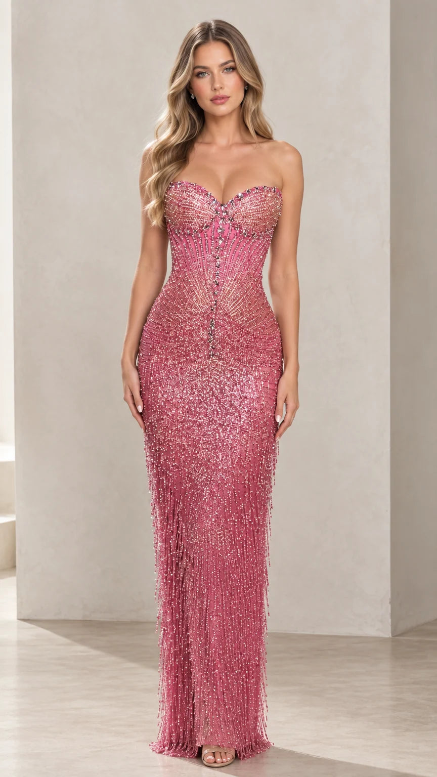 Front view of woman wearing strapless rose pink beaded fringe evening gown