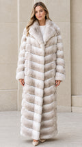 Front full-length view of model wearing Light Gray chevron maxi faux fur coat