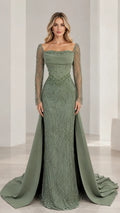 Sage green beaded evening gown with long sheer sleeves and sweeping overskirt front view