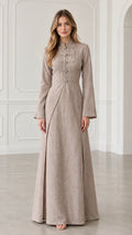 Front view of model wearing oatmeal mandarin collar frog button maxi dress