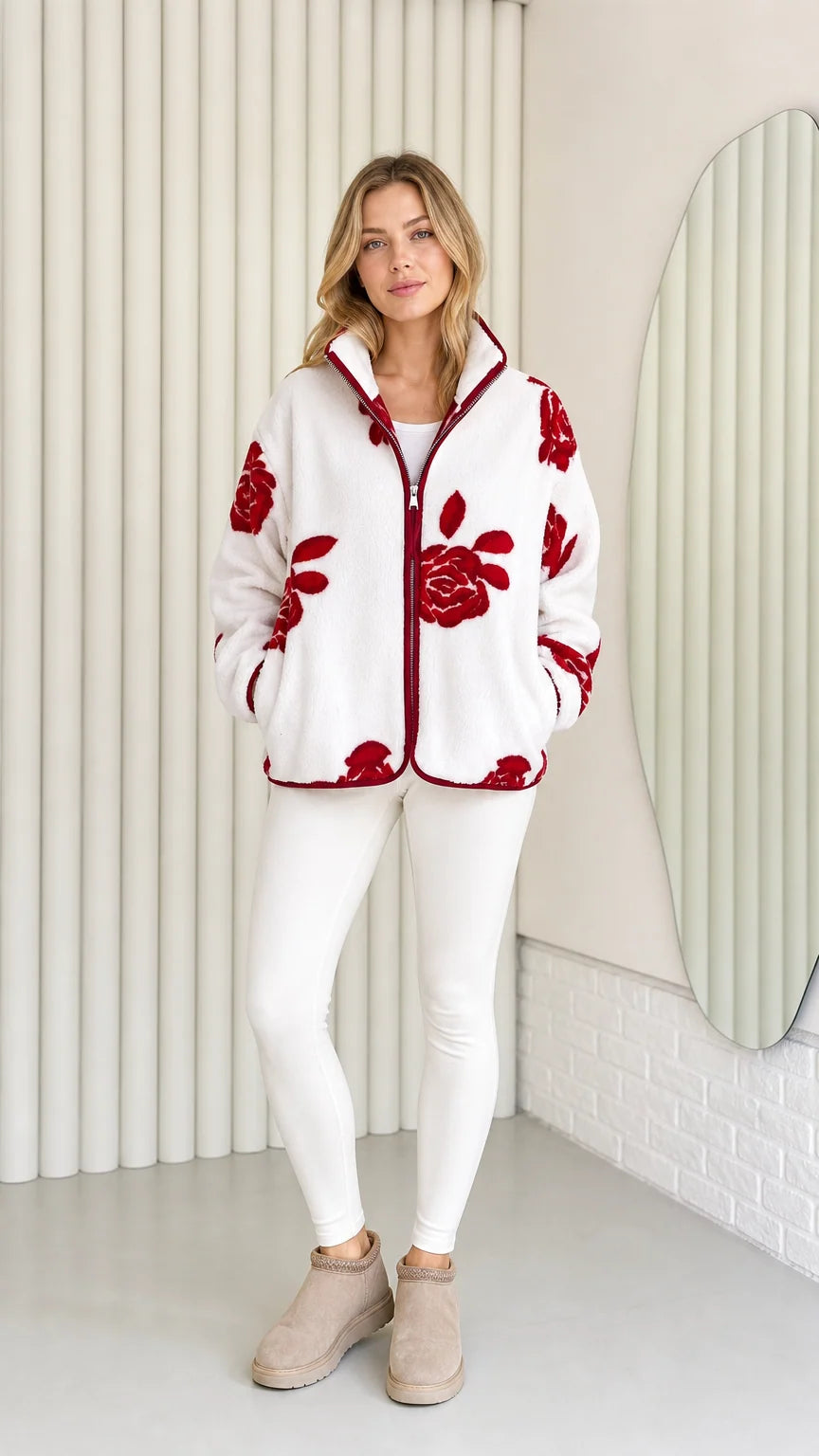 Model wearing white fleece jacket with red floral pattern and contrast trim front view