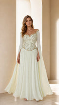 Front view of ivory embellished long sleeve evening gown