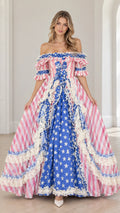 Front view of model wearing pink and blue star and stripe off-the-shoulder Victorian ball gown