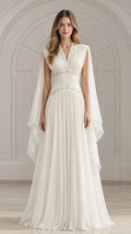 Front view of model wearing ivory white beaded V-neck chiffon evening gown with cape sleeves