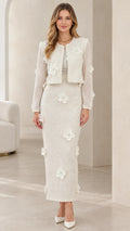 Full front view of model wearing ivory tweed cropped jacket and maxi skirt set with 3D floral appliques