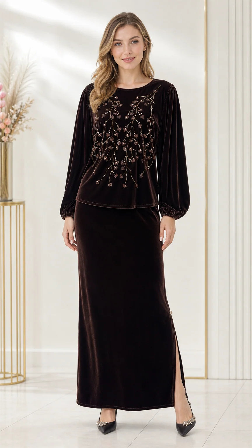 Front full-length view of woman wearing a dark brown beaded velvet two-piece maxi skirt set