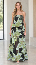 Model wearing black floral jacquard tiered peplum maxi dress front view