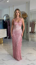 Dusty Rose halter neck corset maxi dress with 3D floral details and fringe skirt front view