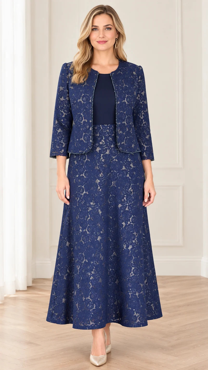 Front view of woman wearing navy blue floral lace two-piece maxi dress set with beaded jacket