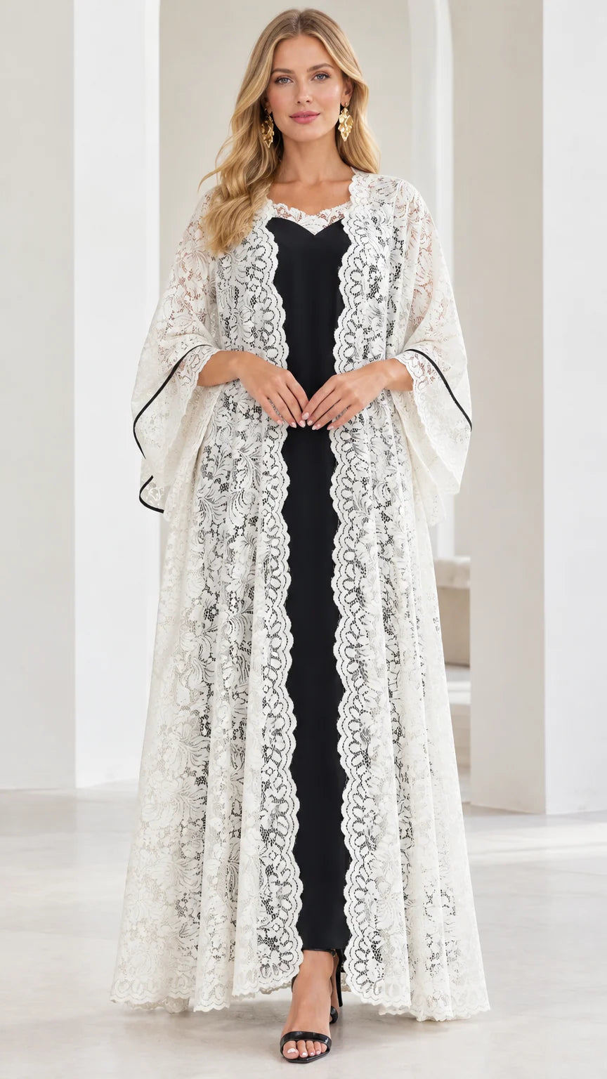 Front full view of white floral lace duster cardigan over black maxi slip dress