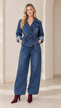 Front view of model wearing Classic Blue belted denim jacket and wide-leg pants set