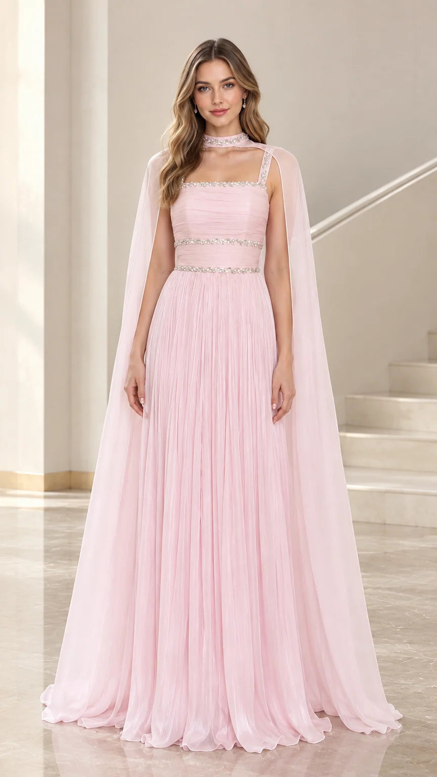 Front view of Light Pink chiffon evening gown with crystal trim and attached cape