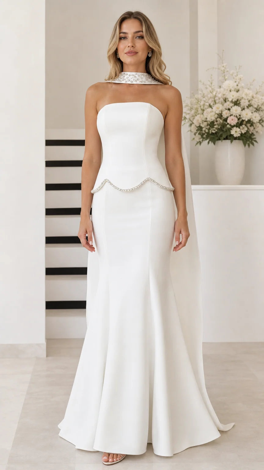 White strapless mermaid evening gown with embellished neck cape front view