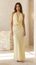 Front view of yellow halter cowl neck maxi dress