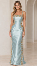Front view of woman wearing Light Blue square neck satin maxi dress with gold beaded trim