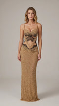 Front full-length view of model wearing gold beaded corset cutout evening maxi dress