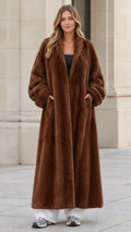 Front view of woman wearing chocolate brown longline plush faux fur maxi coat