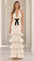Cream floral lace halter maxi dress with plunge neckline and black velvet waist bow front view