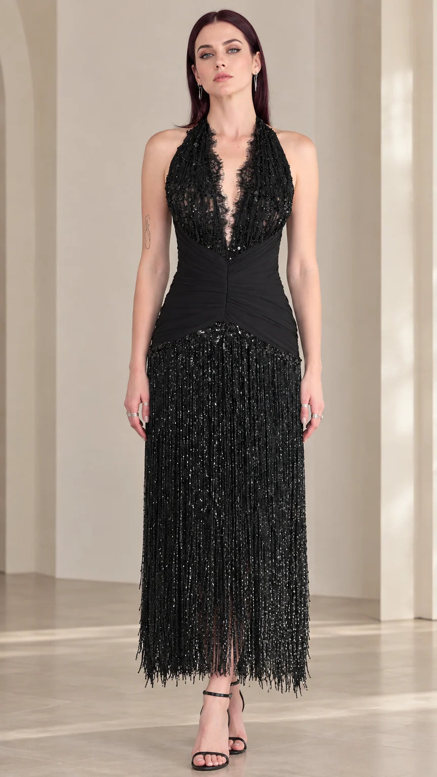 Front view of black halter neck sequin fringe evening dress on model