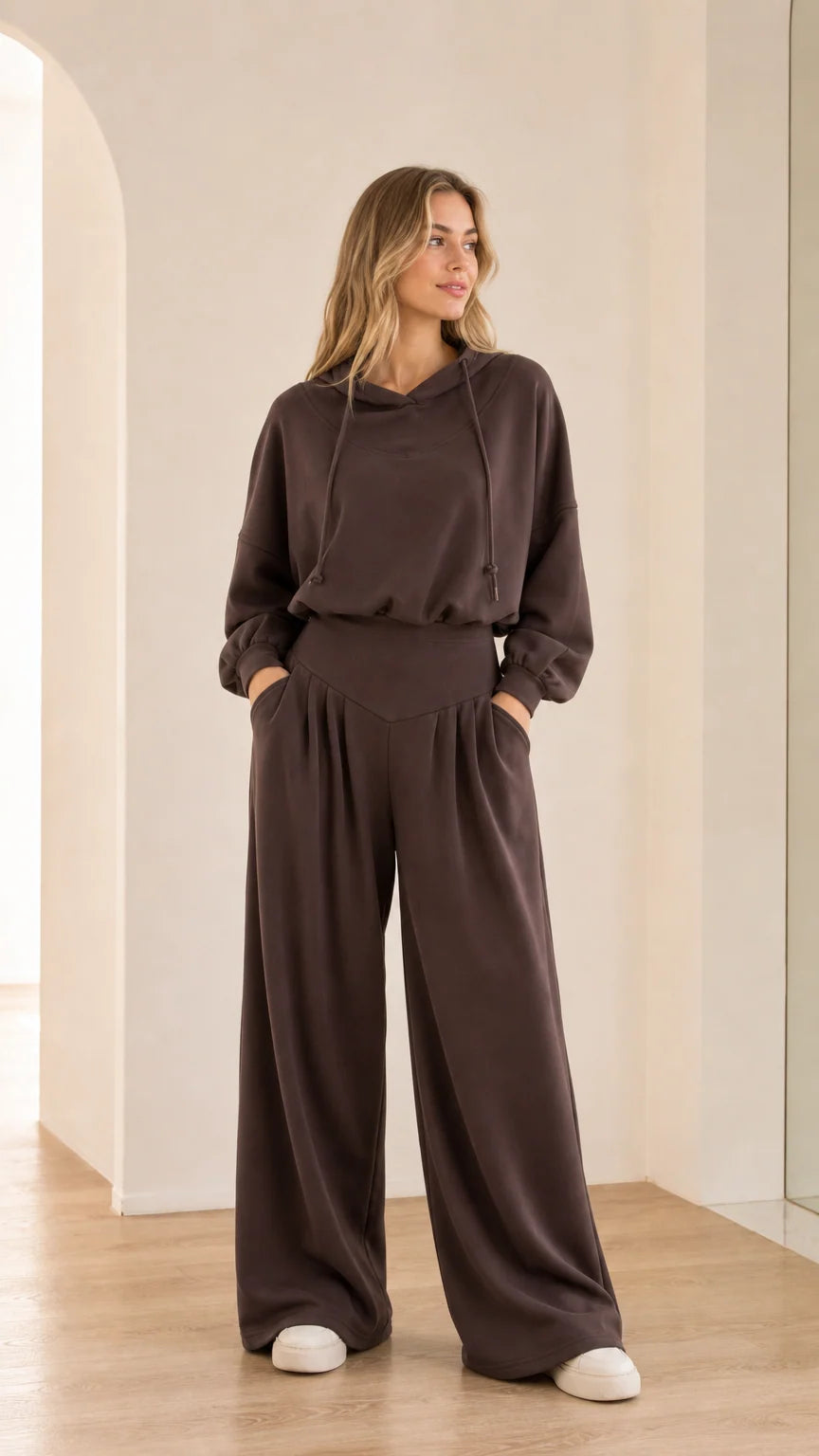 Front view of model wearing chocolate brown 2-piece hooded wide-leg lounge set