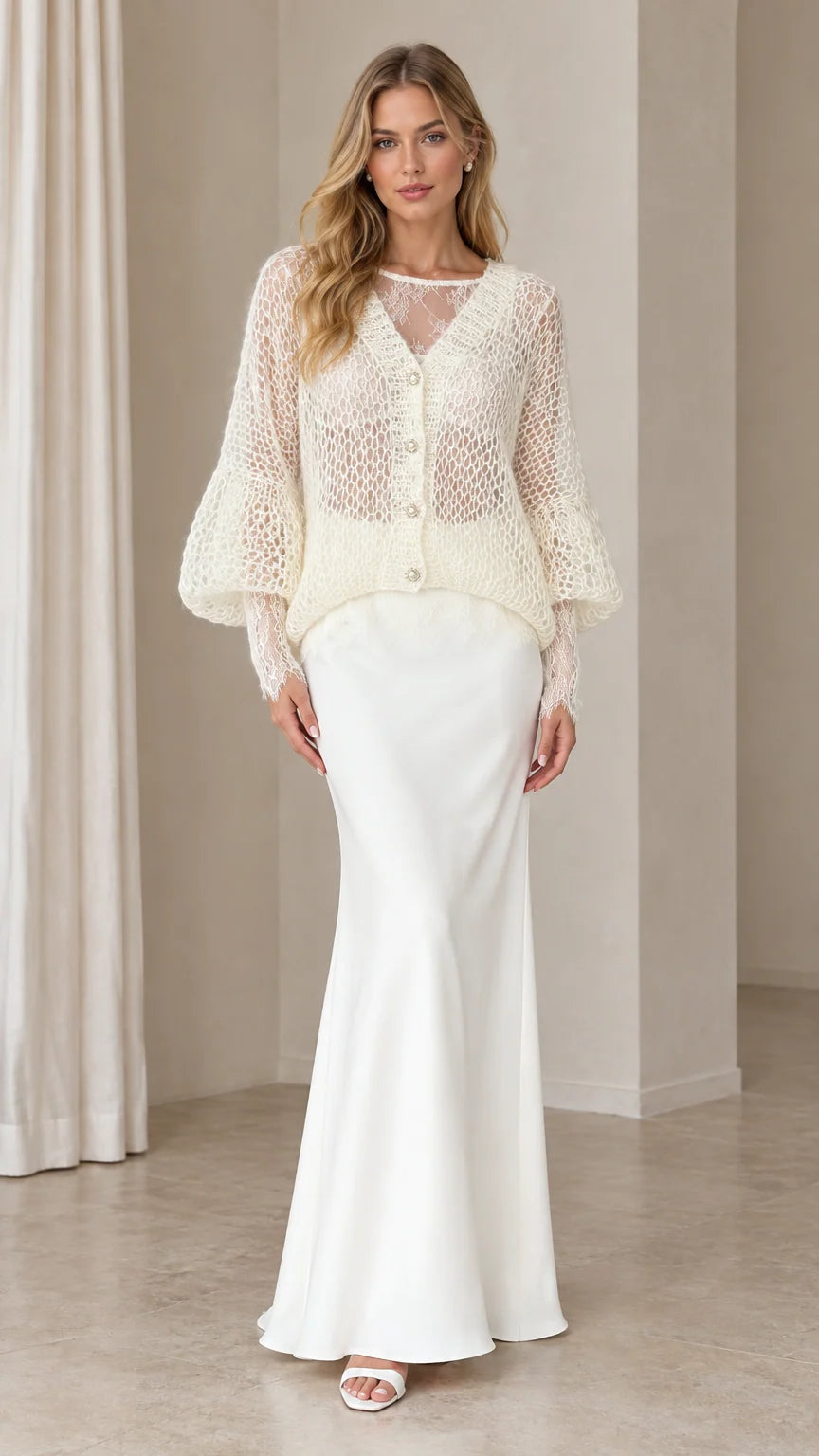 Front full-length view of woman wearing Ivory lace inset open-knit cardigan and matching maxi skirt set