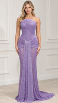Front view of model wearing lavender strapless sequin mermaid gown with cascading drape