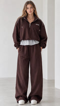 Front full view of women's chocolate brown half-zip layered pullover and wide-leg tracksuit set