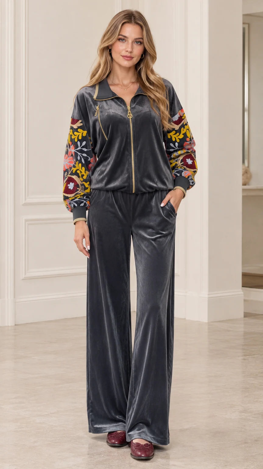 Women's charcoal velvet tracksuit set front view showing floral embroidered sleeves