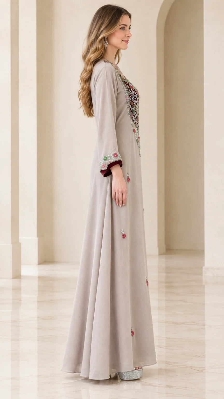 Side profile of beige embroidered A-line maxi dress
