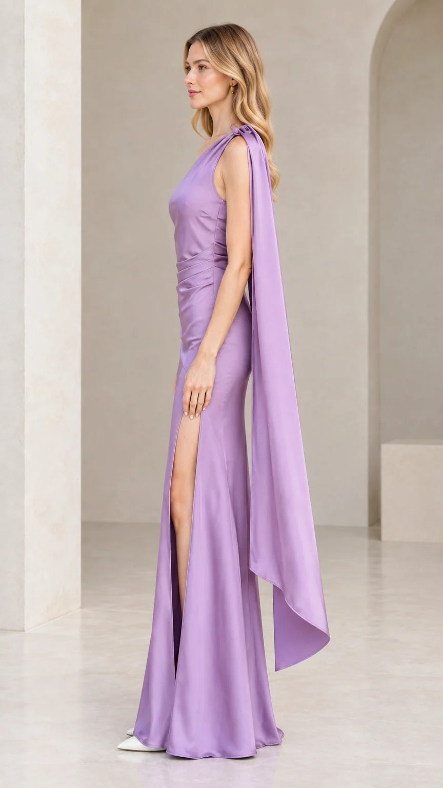 Side profile of lavender one-shoulder satin evening dress showing the high leg slit