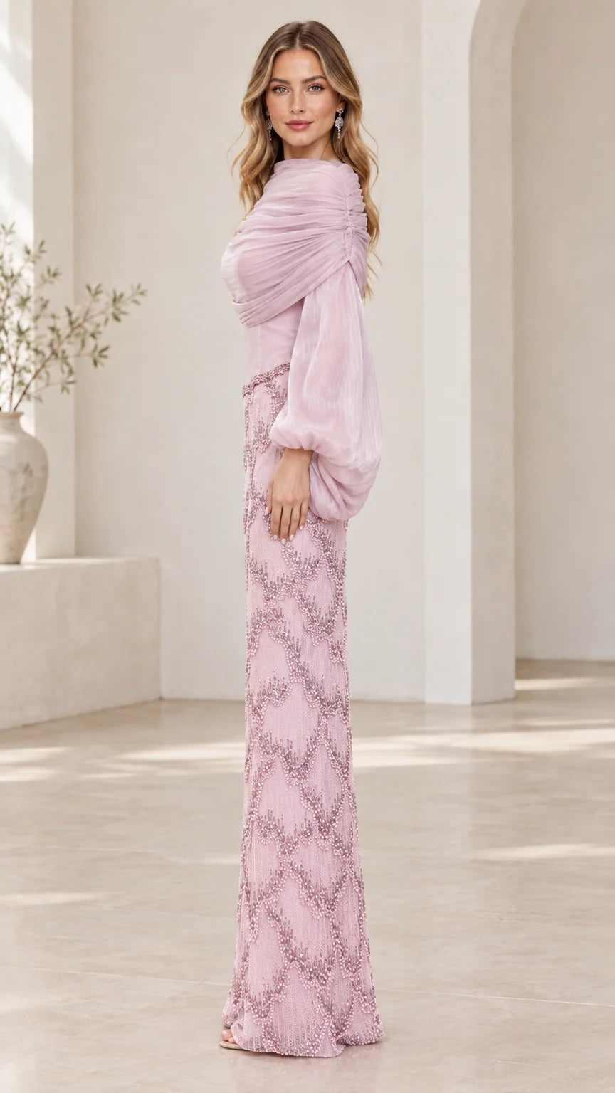 Side profile of dusty pink long sleeve beaded formal evening maxi gown