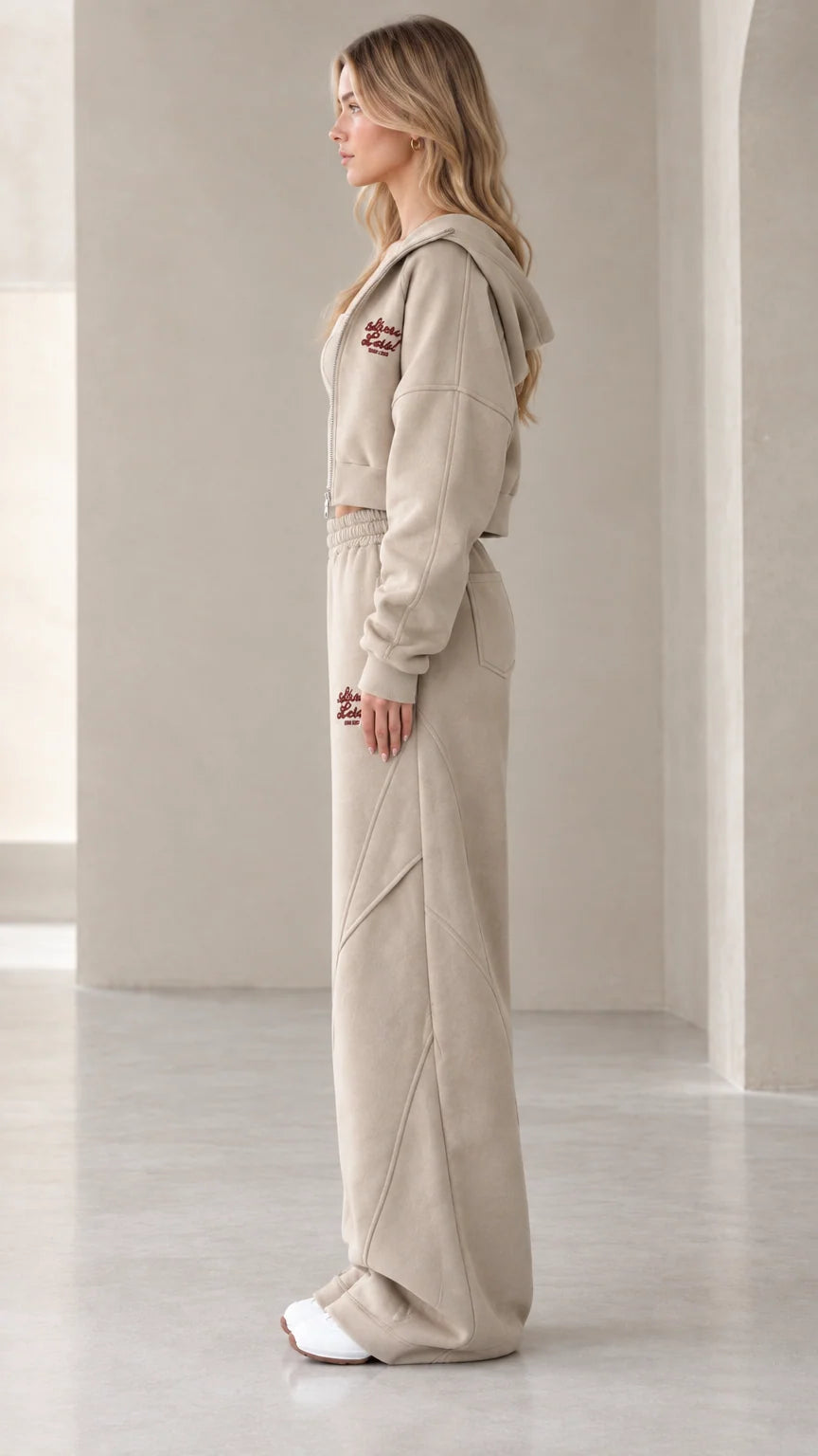 Side profile view of oatmeal 3-piece fleece loungewear set showing panel detailing