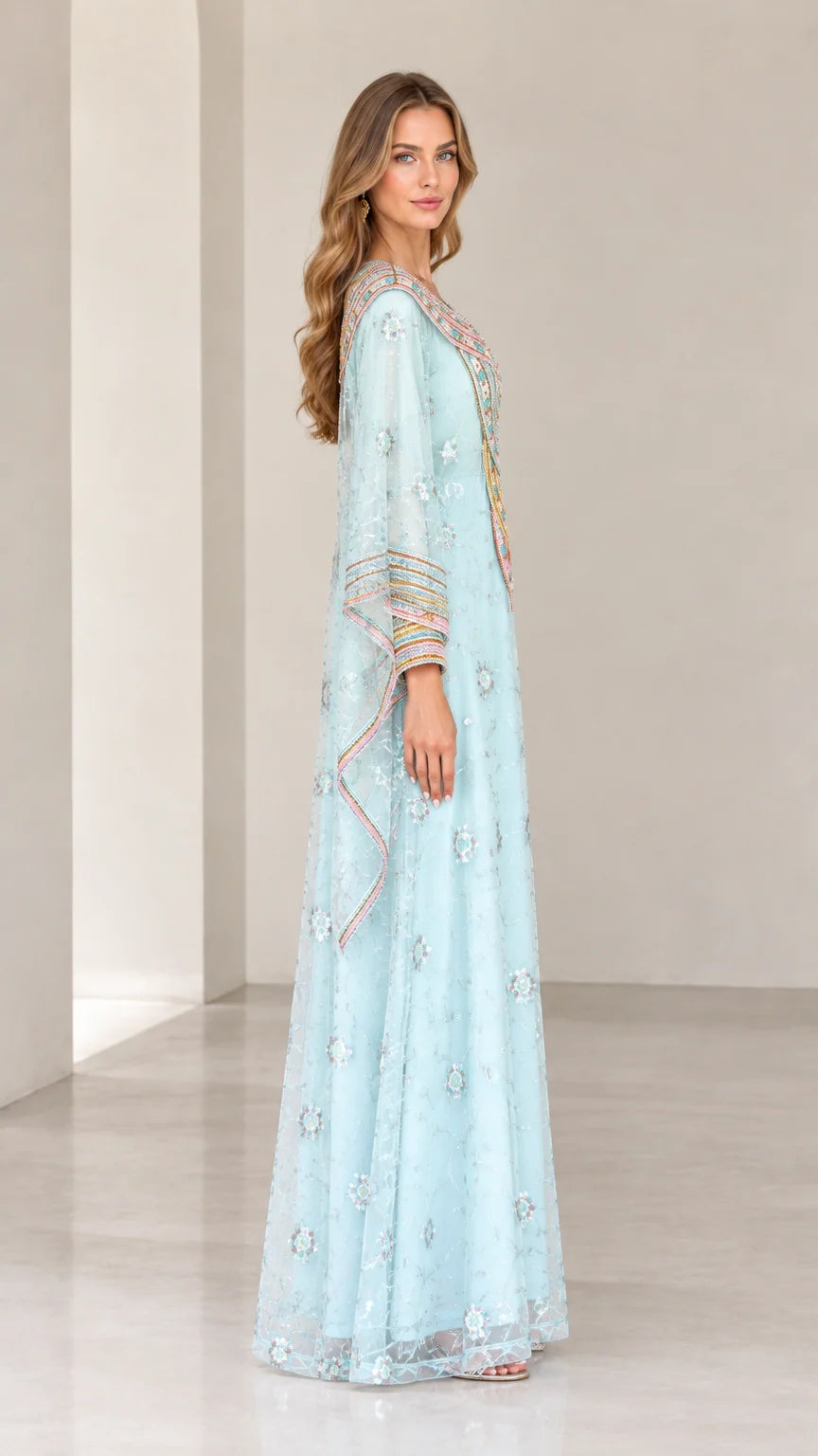 Side profile view of woman wearing Light Blue beaded kaftan maxi dress