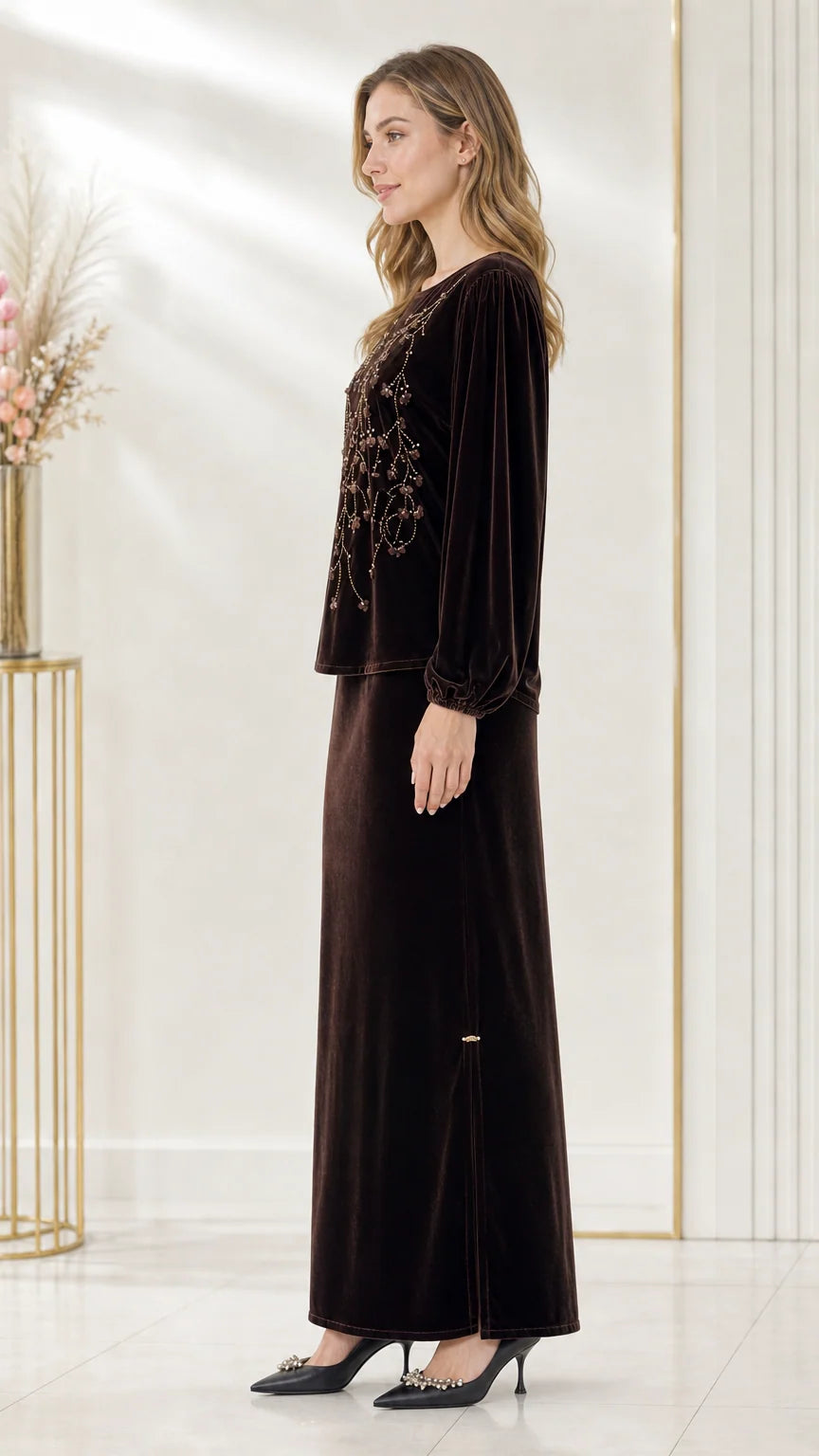 Side full-length view of dark brown velvet matching set showing the skirt side slit